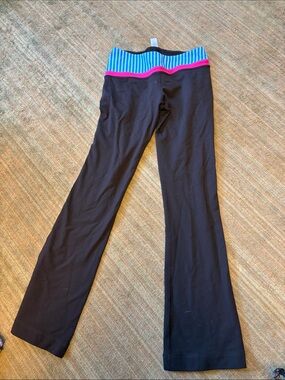 Ivivva Thrive Black Leggings with Blue Striped and Pink Trim Waistband